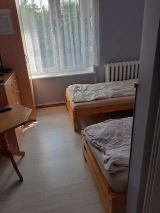 Проживание в семье Pokoje Gościnne Pod Wiatrakiem Kiekrz Двухместный номер с 1 кроватью или 2 отдельными кроватями, общая ванная комната-2